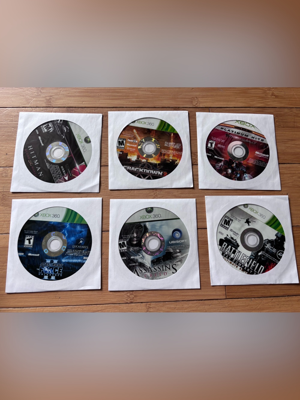 Game Disc Lot - XBox 360. Multiple Titles - White Sleeve.